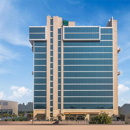 โกลเดน ทิวลิป สวีท คุรคาออน Hotel คูร์เคาน์ ภายนอก รูปภาพ